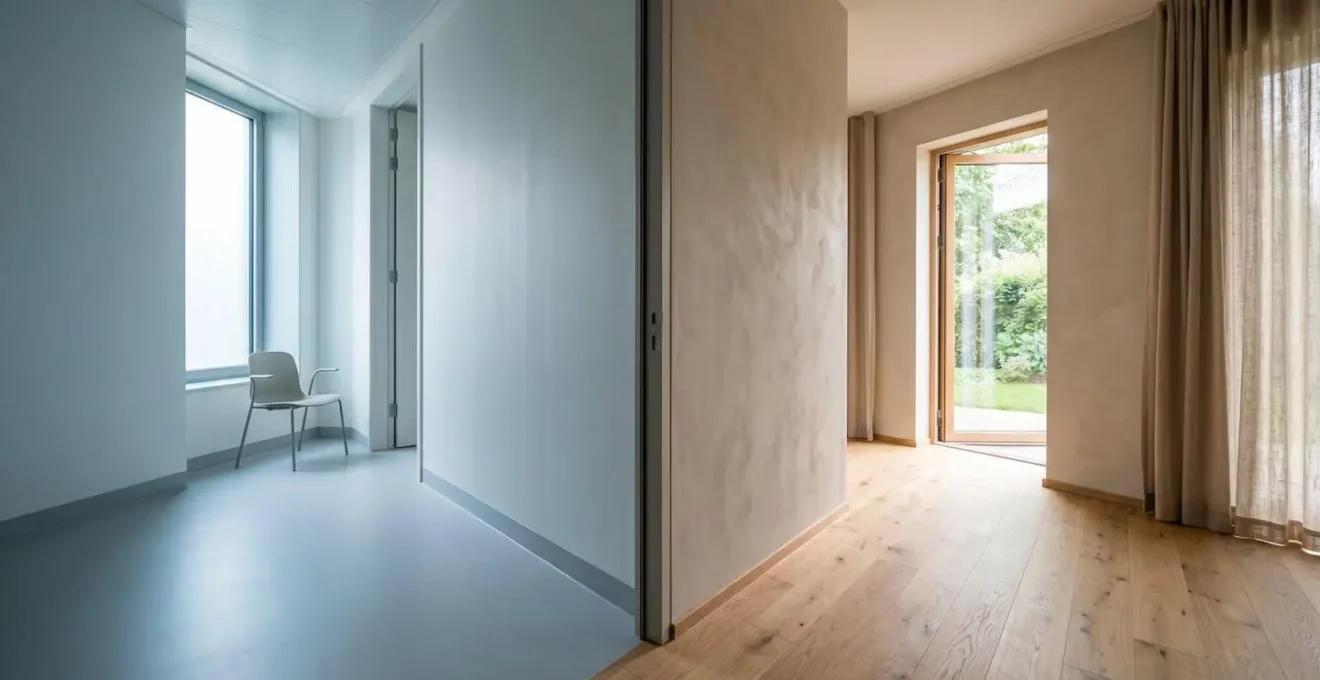 Wide environmental view showing the transition space between clinical and home care settings with natural light and open space